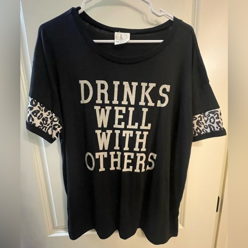 Black and Leopard Tee “Drinks Well With Others”‎ size Large